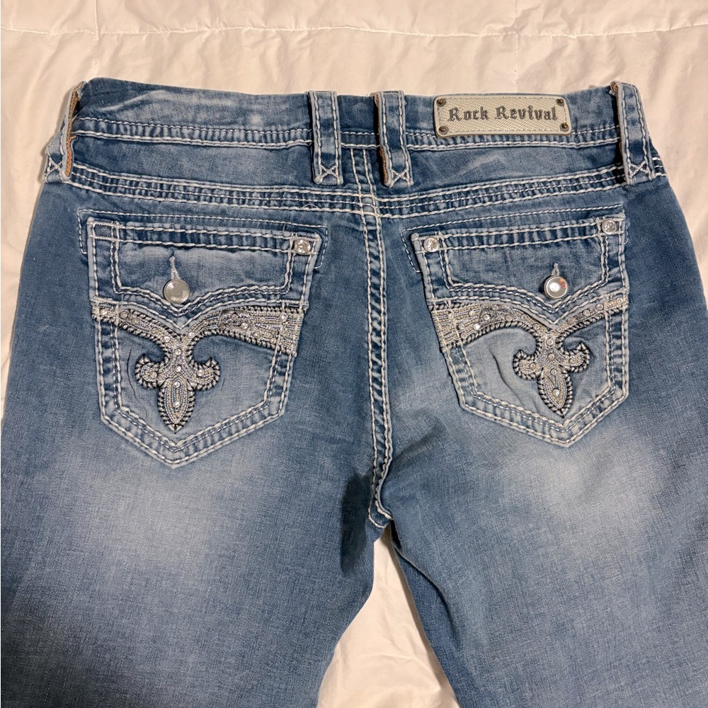Rock Revival boot cut. studded jeans.